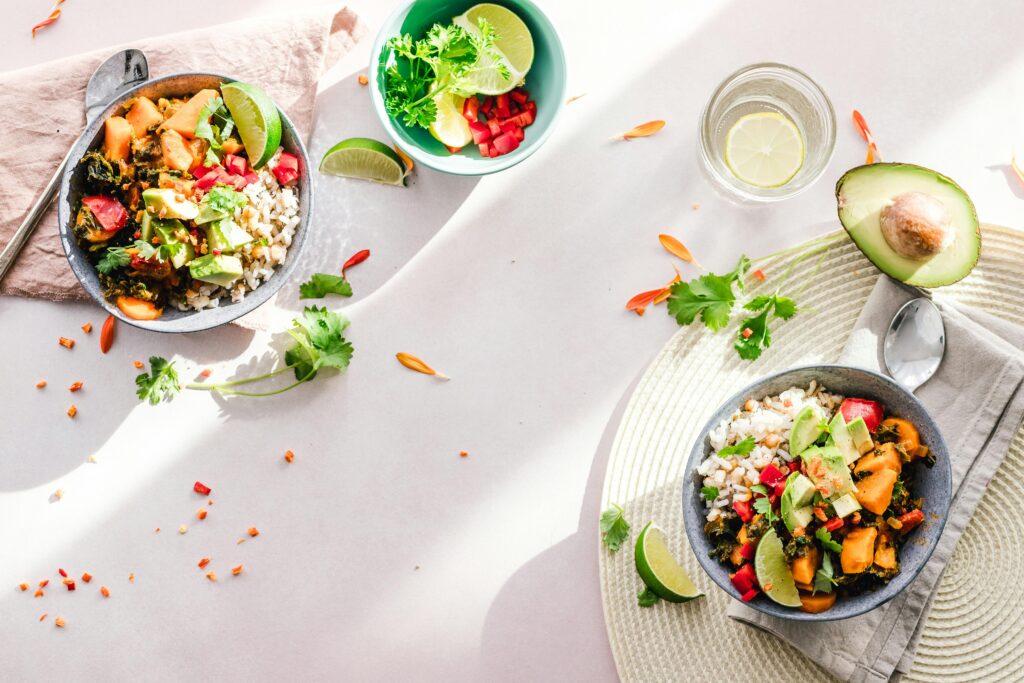 pexels-photo-1640770-1640770 Top-down view of vibrant vegan bowls filled with fresh vegetables, perfect for a healthy meal.